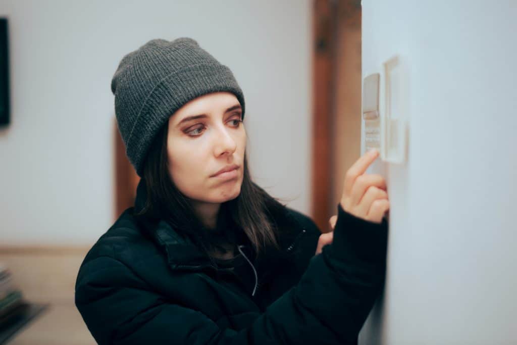 Home resident adjusting settings
